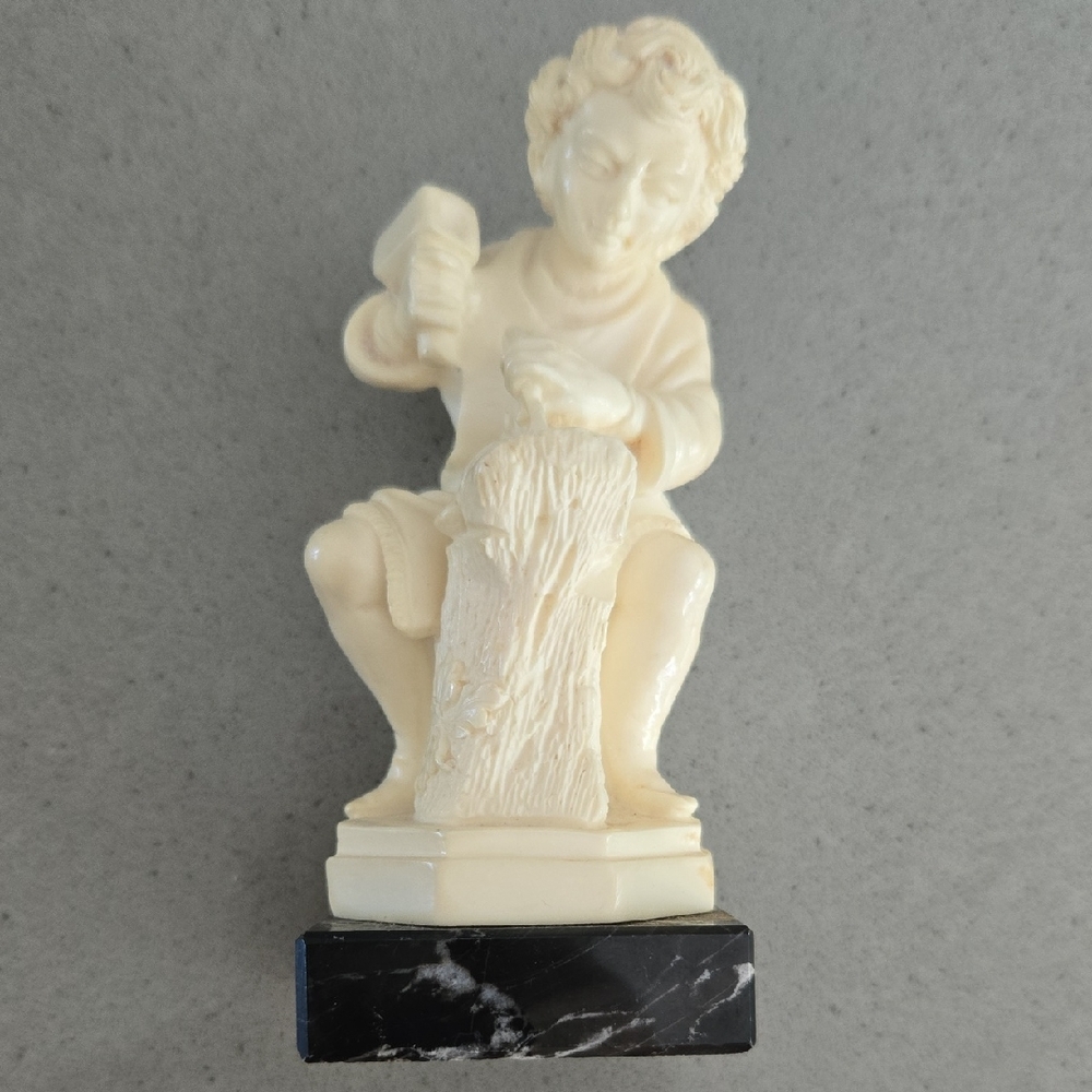 Elegant Cream Sculptor Figurine on Black Base